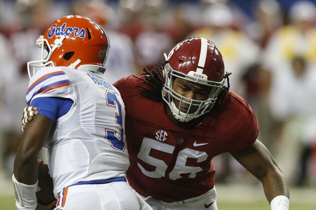 Dec 5, 2015; Atlanta, GA, USA; Alabama Crimson Tide linebacker Tim Williams (56) tackles Florida Gators quarterback Treon Harris (3) during the second quarter in the 2015 SEC Championship Game at the Georgia Dome. Mandatory Credit: Butch Dill-USA TODAY Sports