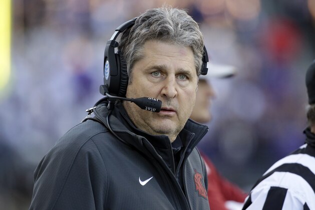 Washington State head coach Mike Leach stands on the sidelines in an NCAA college football game against Washington Friday, Nov. 27, 2015, in Seattle. (AP Photo/Elaine Thompson)
