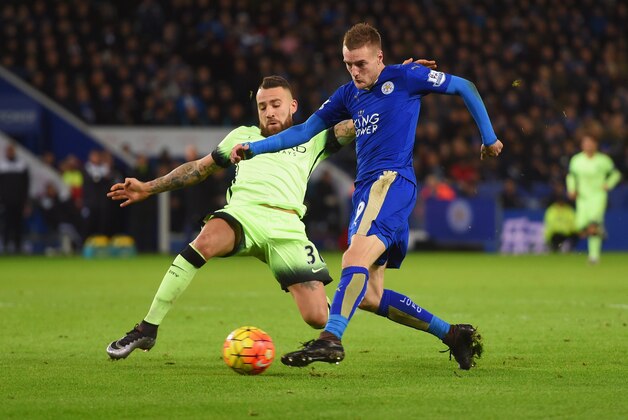 LEICESTER, ENGLAND - DECEMBER 29:  Jamie Vardy of Leicester City is challenged by Nicolas Otamendi of Manchester City as he shoots during the Barclays Premier League match between Leicester City and Manchester City at The King Power Stadium on December 29, 2015 in Leicester, England.  (Photo by Michael Regan/Getty Images)
