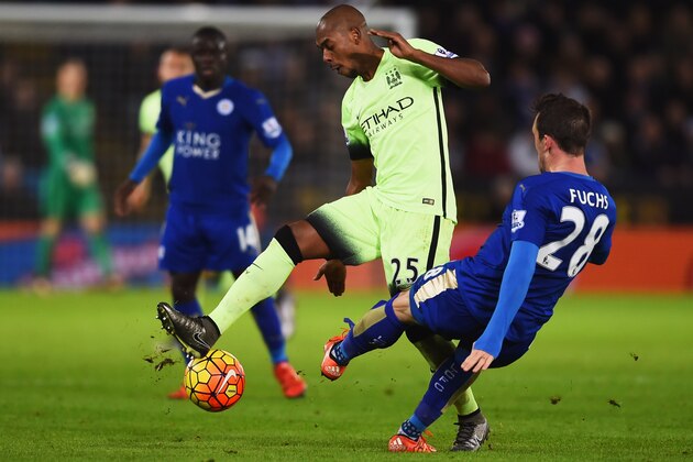 LEICESTER, ENGLAND - DECEMBER 29:  Fernandinho of Manchester City is challenged by Christian Fuchs of Leicester City during the Barclays Premier League match between Leicester City and Manchester City at The King Power Stadium on December 29, 2015 in Leicester, England.  (Photo by Laurence Griffiths/Getty Images)