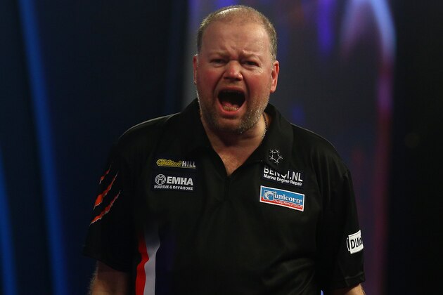 LONDON, ENGLAND - DECEMBER 27: Raymond van Barneveld of Holland celebrates winning his second round match against Stephen Bunting of England  during the 2016 William Hill PDC World Darts Championships on Day Nine at Alexandra Palace on December 27, 2015 in London, England. (Photo by Charlie Crowhurst/Getty Images)