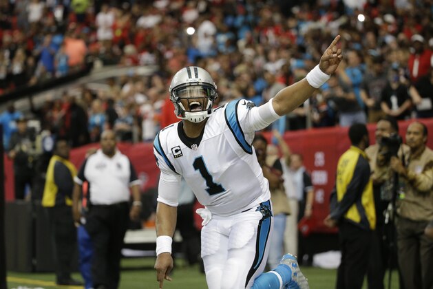 Carolina Panthers quarterback Cam Newton (1) celebrates his touchdown against the Atlanta Falcons during the first half of an NFL football game, Sunday, Dec. 27, 2015, in Atlanta. (AP Photo/David Goldman)