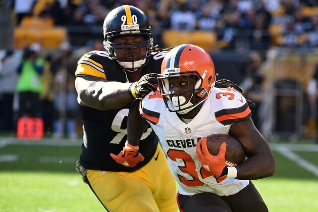 PITTSBURGH, PA - NOVEMBER 15:  Running back Isaiah Crowell #34 of the Cleveland Browns is pursued by defensive lineman Steve McLendon #90 of the Pittsburgh Steelers during a game at Heinz Field on November 15, 2015 in Pittsburgh, Pennsylvania.  The Steelers defeated the Browns 30-9. (Photo by George Gojkovich/Getty Images)