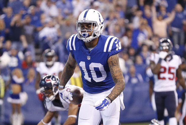 Indianapolis Colts' Donte Moncrief (10) goes in for a 11-yard touchdown reception during the first half of an NFL football game against the Houston Texans, Sunday, Dec. 20, 2015, in Indianapolis. (AP Photo/AJ Mast)