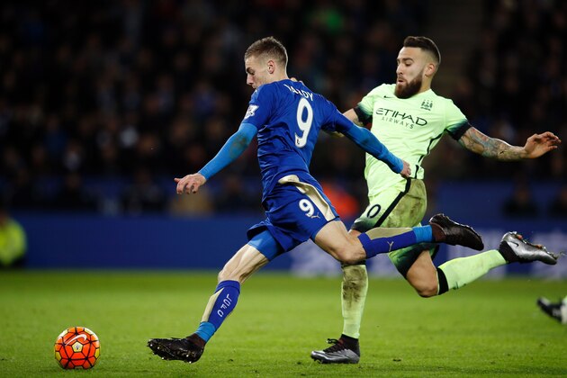 Leicester City's English striker Jamie Vardy prepares to shoot as Manchester City's Argentinian defender Nicolas Otamendi (R) closes in during the English Premier League football match between Leicester City and Manchester City at King Power Stadium in Leicester, central England on December 29, 2015.  AFP PHOTO / ADRIAN DENNIS

RESTRICTED TO EDITORIAL USE. No use with unauthorized audio, video, data, fixture lists, club/league logos or 'live' services. Online in-match use limited to 75 images, no video emulation. No use in betting, games or single club/league/player publications. / AFP / ADRIAN DENNIS        (Photo credit should read ADRIAN DENNIS/AFP/Getty Images)