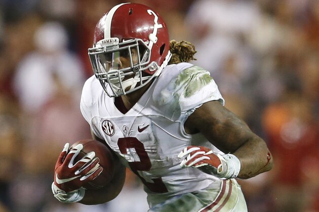 Alabama running back Derrick Henry (2) runs the ball during the second half of an NCAA college football game, Saturday, Nov. 28, 2015, in Auburn, Ala. (AP Photo/Butch Dill)