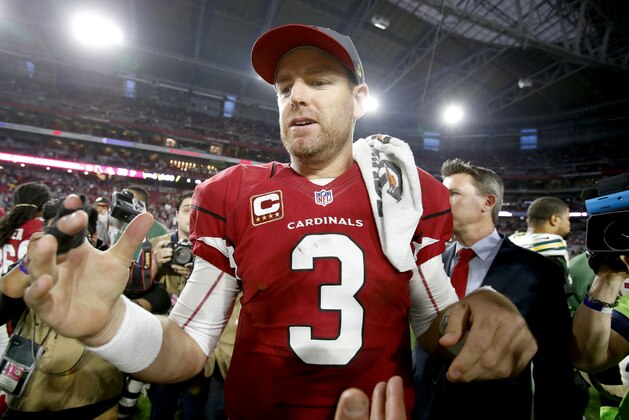 Arizona Cardinals quarterback Carson Palmer (3) stands at mid field after an NFL football game against the Green Bay Packers, Sunday, Dec. 27, 2015, in Glendale, Ariz. The Cardinals won 38-8. (AP Photo/Rick Scuteri)