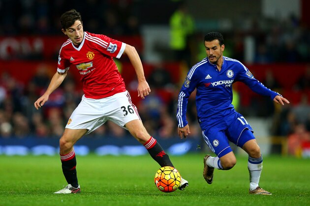 MANCHESTER, ENGLAND - DECEMBER 28:  Pedro of Chelsea battles for the ball with Matteo Darmian of Manchester United during the Barclays Premier League match between Manchester United and Chelsea at Old Trafford on December 28, 2015 in Manchester, England.  (Photo by Alex Livesey/Getty Images)
