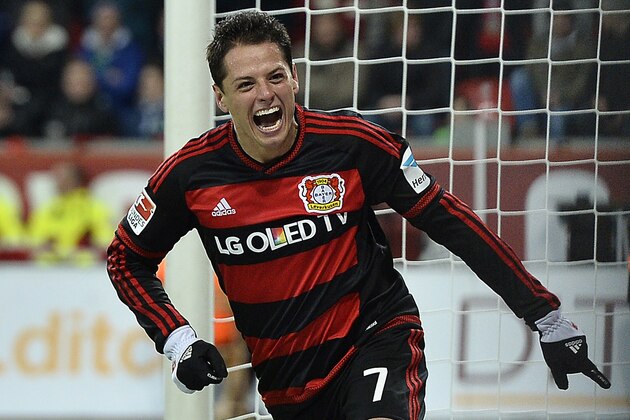 Leverkusen’s Javier Hernandez celebrates his third goal during the German Bundesliga soccer match between Bayer Leverkusen and Borussia Moenchengladbach in Leverkusen, Germany, Saturday, Dec. 12, 2015. Leverkusen defeated Moenchengladbach 5-0, Hernandez scored three goals. (AP Photo/Martin Meissner)