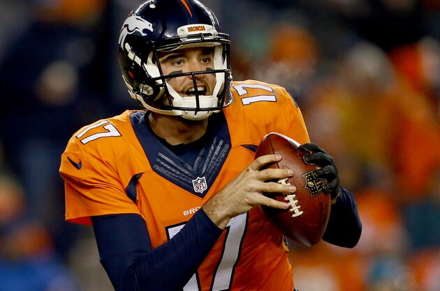 Denver Broncos quarterback Brock Osweiler (17) scrambles against the Cincinnati Bengals during the first half of an NFL football game, Monday, Dec. 28, 2015, in Denver. (AP Photo/Joe Mahoney)