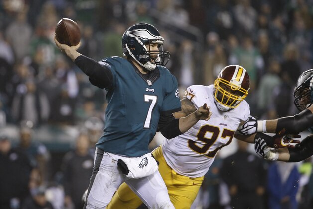 Philadelphia Eagles' Sam Bradford looks to pass in the second half of an NFL football game against the Washington Redskins, Saturday, Dec. 26, 2015, in Philadelphia.  (AP Photo/Matt Rourke)