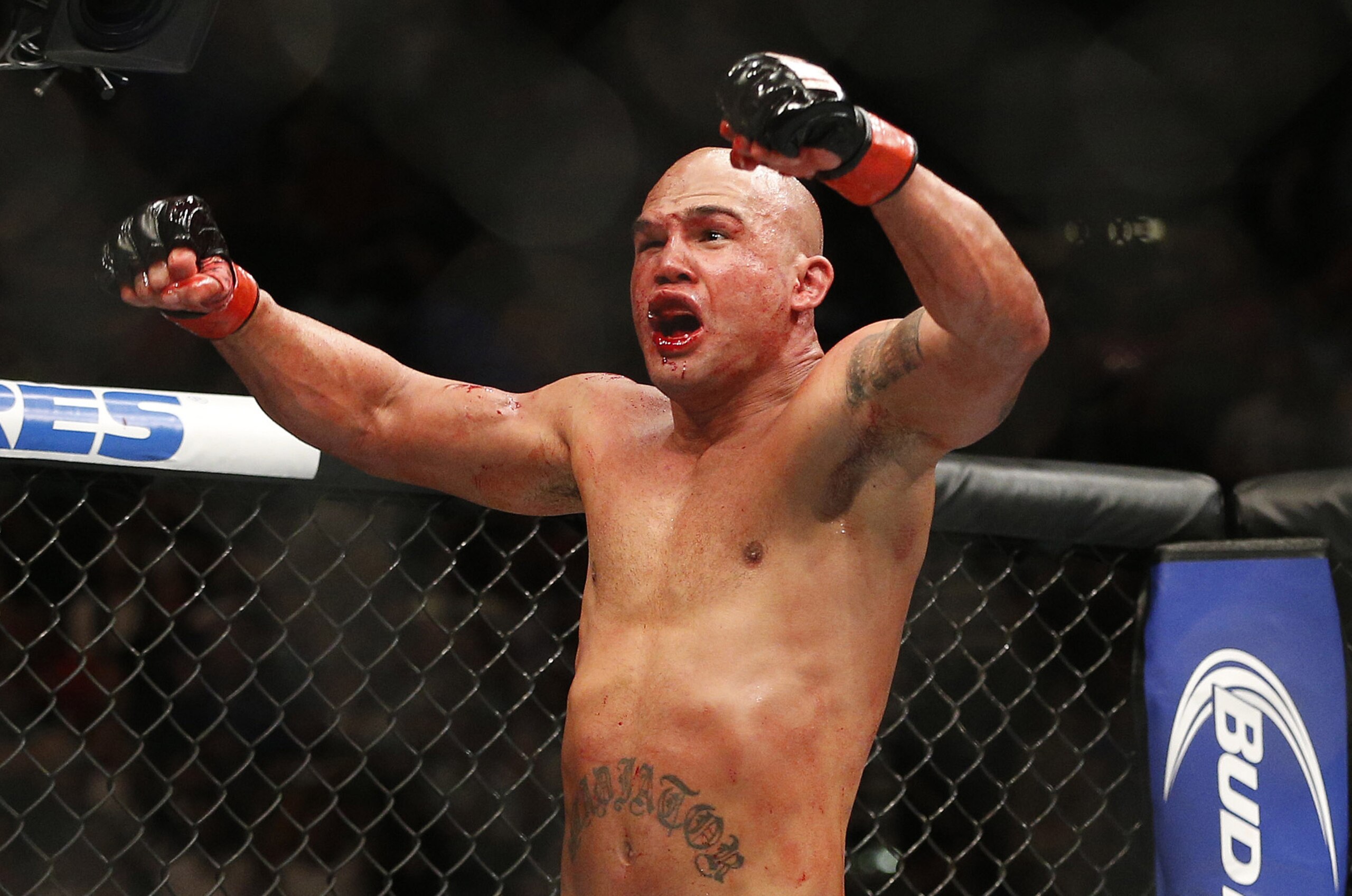Robbie Lawler celebrates after defeating Rory MacDonald in their welterweight title mixed martial arts bout at UFC 189 on Saturday, July 11, 2015, in Las Vegas. (AP Photo/John Locher)