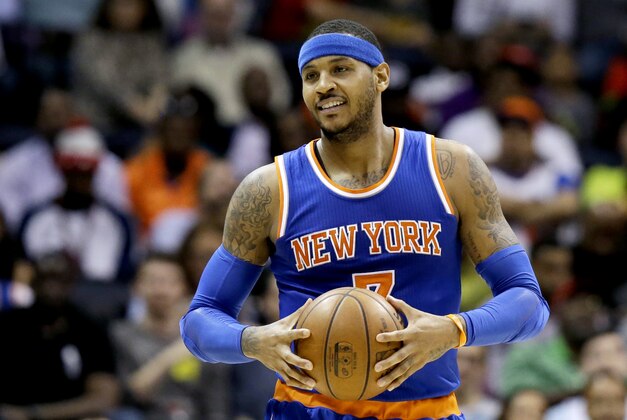New York Knicks' Carmelo Anthony walks down the court after being called for an offensive foul in the second quarter of an NBA basketball game against the Atlanta Hawks Saturday, Dec. 26, 2015, in Atlanta. (AP Photo/David Goldman)