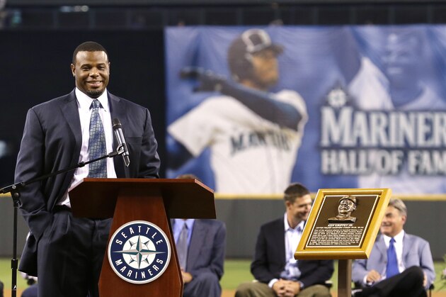 Former Seattle Mariners outfielder Ken Griffey Jr. speaks during a pregame ceremony to induct him into the baseball team's Hall of Fame, Saturday, Aug. 10, 2013, in Seattle. (AP Photo/Elaine Thompson)