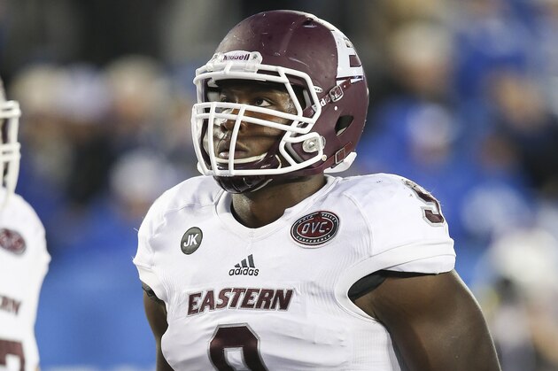 Eastern Kentucky defensive lineman Noah Spence warms up before an NCAA college football game against Kentucky, Saturday, Oct. 3, 2015, in Lexington, Ky. Kentucky won the game 34-27 in overtime. (AP Photo/David Stephenson)