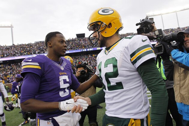 Minnesota Vikings quarterback Teddy Bridgewater, left, talks with Green Bay Packers quarterback Aaron Rodgers after an NFL football game, Sunday, Nov. 23, 2014, in Minneapolis. The Packers won 24-21. (AP Photo/Ann Heisenfelt)