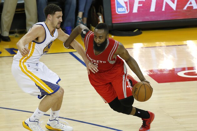 Houston Rockets guard James Harden, left, dribbles against Golden State Warriors guard Klay Thompson during the second half of Game 1 of the NBA basketball Western Conference finals in Oakland, Calif., Tuesday, May 19, 2015. (AP Photo/Tony Avelar) Houston Rockets guard James Harden, left, dribbles against Golden State Warriors guard Klay Thompson during the second half of Game 1 of the NBA basketball Western Conference finals in Oakland, Calif., Tuesday, May 19, 2015. (AP Photo/Tony Avelar)