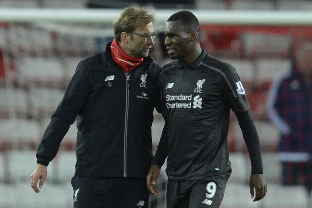 Liverpool's German manager Jurgen Klopp (L) talks with goalscorer Liverpool's Zaire-born Belgian striker Christian Benteke (R) after the final whistle in the English Premier League football match between Sunderland and Liverpool at the Stadium of Light in Sunderland, north east England, on December 30, 2015. AFP PHOTO / OLI SCARFF
RESTRICTED TO EDITORIAL USE. No use with unauthorized audio, video, data, fixture lists, club/league logos or 'live' services. Online in-match use limited to 75 images, no video emulation. No use in betting, games or single club/league/player publications. / AFP / OLI SCARFF (Photo credit should read OLI SCARFF/AFP/Getty Images) Liverpool's German manager Jurgen Klopp (L) talks with goalscorer Liverpool's Zaire-born Belgian striker Christian Benteke (R) after the final whistle in the English Premier League football match between Sunderland and Liverpool at the Stadium of Light in Sunderland, north east England, on December 30, 2015. AFP PHOTO / OLI SCARFF
RESTRICTED TO EDITORIAL USE. No use with unauthorized audio, video, data, fixture lists, club/league logos or 'live' services. Online in-match use limited to 75 images, no video emulation. No use in betting, games or single club/league/player publications. / AFP / OLI SCARFF (Photo credit should read OLI SCARFF/AFP/Getty Images)