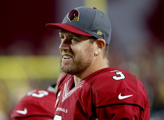 Arizona Cardinals quarterback Carson Palmer (3) watches from the sidelines during the second half of an NFL football game against the Green Bay Packers, Sunday, Dec. 27, 2015, in Glendale, Ariz. (AP Photo/Rick Scuteri)