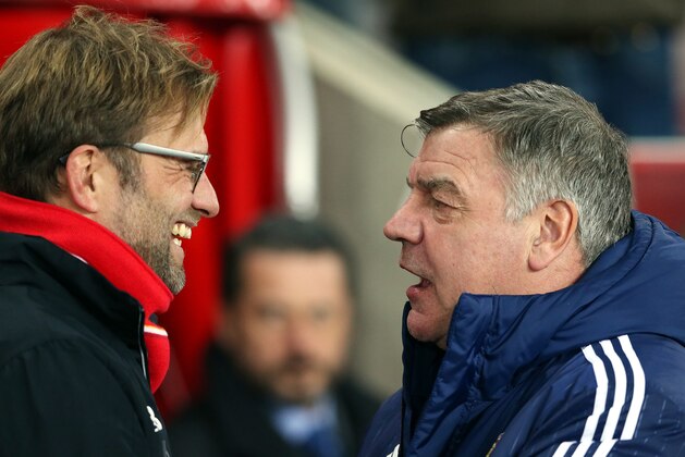 Liverpool's manager Jurgen Klopp, left, and Sunderland's manager Sam Allardyce speak ahead of the start of the English Premier League soccer match between Sunderland and Liverpool at the Stadium of Light, Sunderland, England, Wednesday, Dec. 30, 2015. (AP Photo/Scott Heppell)