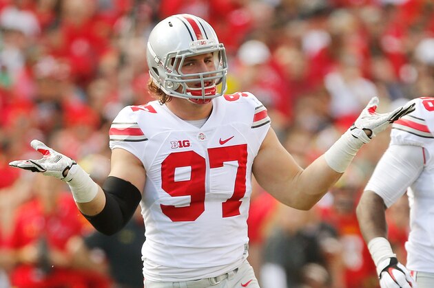 COLLEGE PARK, MD - OCTOBER 04:  Defensive end Joey Bosa #97 of the Ohio State Buckeyes celebrates after one of his first-half sacks against the Maryland Terrapins at Byrd Stadium on October 4, 2014 in College Park, Maryland. Also pictured is teammate Steve Miller #88. (Photo by Jonathan Ernst/Getty Images)