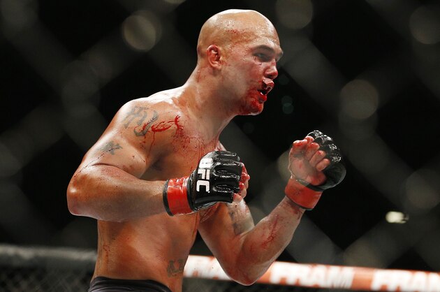 Robbie Lawler, pictured, fights Rory MacDonald during their welterweight title fight mixed martial arts bout at UFC 189 Saturday, July 11, 2015, in Las Vegas. (AP Photo/John Locher)