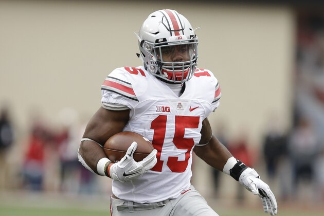 Ohio State's Ezekiel Elliott runs during the first half of an NCAA college football game against Indiana, Saturday, Oct. 3, 2015 in Bloomington, Ind. (AP Photo/Darron Cummings)