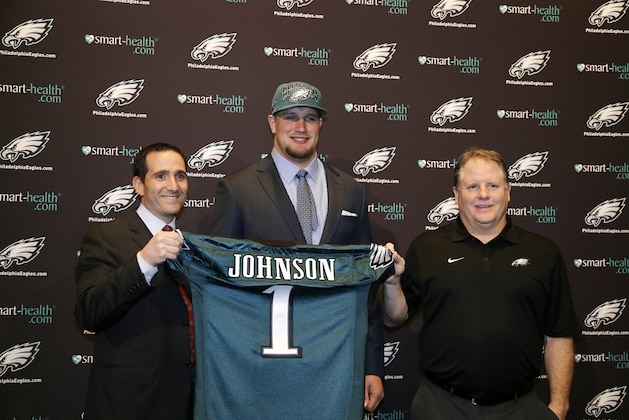 Philadelphia Eagles General Manager Howie Roseman, from left, poses with newly-drafted Lane Johnson and head coach Chip Kelly before a news conference at the team's NFL practice facility, Friday, April 26, 2013, in Philadelphia. (AP Photo/Matt Slocum)
