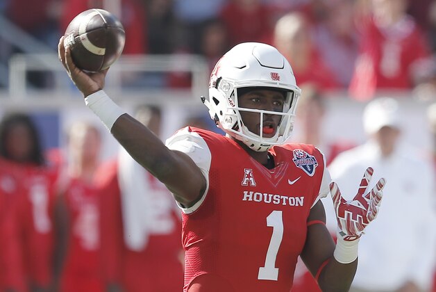 Dec 5, 2015; Houston, TX, USA; Houston Cougars quarterback Greg Ward Jr. (1) passes against the Temple Owls in the first half in the Mid-American Conference football championship game at TDECU Stadium. Mandatory Credit: Thomas B. Shea-USA TODAY Sports