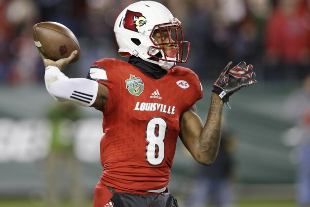 Louisville quarterback Lamar Jackson passes against Texas A&M in the first half of the Music City Bowl NCAA college football game Wednesday, Dec. 30, 2015, in Nashville, Tenn. (AP Photo/Mark Humphrey) Louisville quarterback Lamar Jackson passes against Texas A&M in the first half of the Music City Bowl NCAA college football game Wednesday, Dec. 30, 2015, in Nashville, Tenn. (AP Photo/Mark Humphrey)