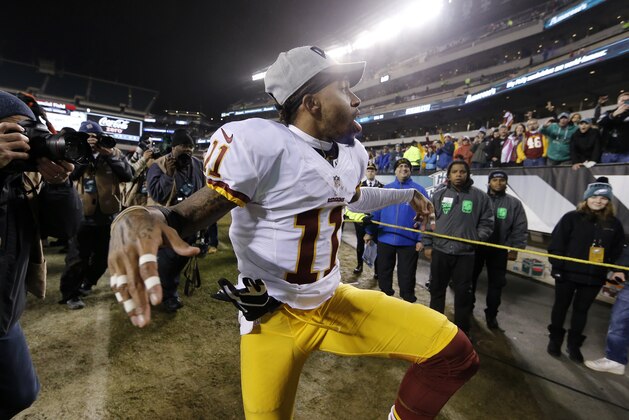 Washington Redskins' DeSean Jackson reacts as he walks off the field after an NFL football game against the Philadelphia Eagles, Saturday, Dec. 26, 2015, in Philadelphia. Washington won 38-24. (AP Photo/Matt Rourke)