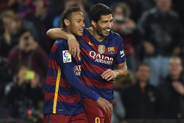 BARCELONA, SPAIN - DECEMBER 30:  Luis Suarez (R) of FC Barcelona celebrates with his teammate Neymar of FC Barcelona after scoring his team's fourth goal during the La Liga match between FC Barcelona and Real Betis Balompie at Camp Nou on December 30, 2015 in Barcelona, Spain.  (Photo by Manuel Queimadelos Alonso/Getty Images)