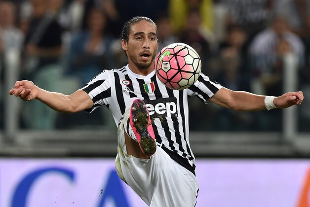 TURIN, ITALY - SEPTEMBER 12:  Martin Caceres of Juventus FC in action during the Serie A match between Juventus FC and AC Chievo Verona at Juventus Arena on September 12, 2015 in Turin, Italy.  (Photo by Valerio Pennicino/Getty Images)