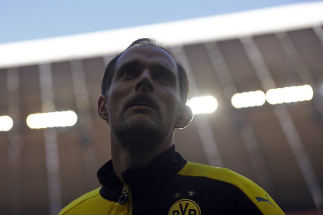 Dortmund head coach Thomas Tuchel arrives for the German Bundesliga soccer match between FC Bayern Munich and Borussia Dortmund at the Allianz Arena stadium in Munich, Germany, Sunday, Oct. 4, 2015. (AP Photo/Matthias Schrader)