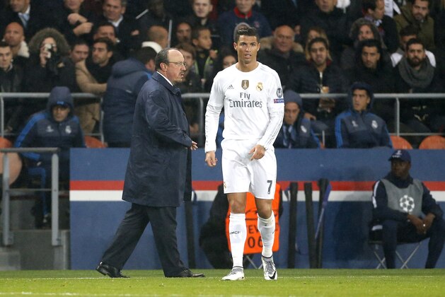 PARIS, FRANCE - OCTOBER 21: Coach of Real Madrid Rafael Benitez and Cristiano Ronaldo of Real Madrid look on during the UEFA Champions League match between Paris Saint-Germain (PSG) and Real Madrid at Parc des Princes stadium on October 21, 2015 in Paris, France. (Photo by Jean Catuffe/Getty Images)