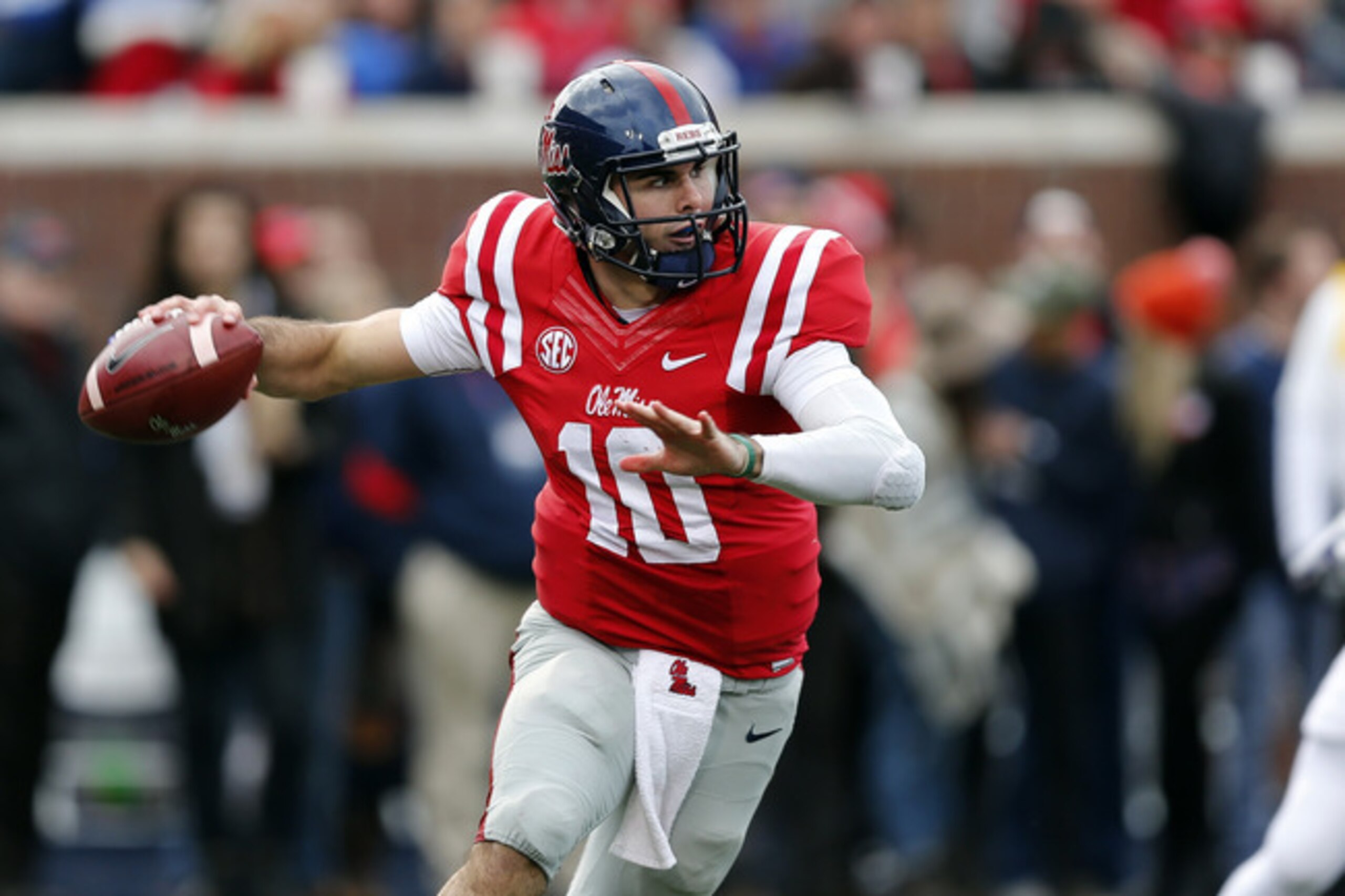 Mississippi quarterback Chad Kelly (10) passes against LSU in the first half of an NCAA college football game in Oxford, Miss., Saturday, Nov. 21, 2015. (AP Photo/Rogelio V. Solis)