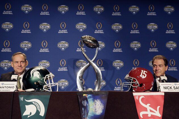 Michigan State head coach Mark Dantonio, left, and Alabama head coach Nick Saban smile during a news conference for the Cotton Bowl NCAA college football game Wednesday, Dec. 30, 2015, in Arlington, Texas. Alabama and Michigan State face off in the Cotton Bowl, a College Football Playoff semifinal, on New Year's eve. (AP Photo/LM Otero)