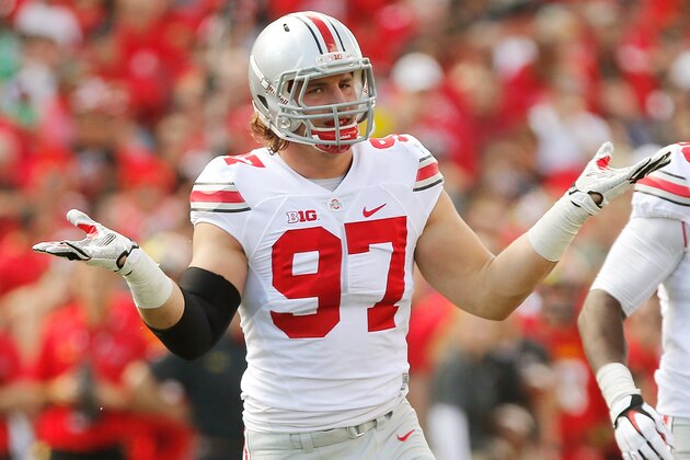 COLLEGE PARK, MD - OCTOBER 04:  Defensive end Joey Bosa #97 of the Ohio State Buckeyes celebrates after one of his first-half sacks against the Maryland Terrapins at Byrd Stadium on October 4, 2014 in College Park, Maryland. Also pictured is teammate Steve Miller #88. (Photo by Jonathan Ernst/Getty Images)
