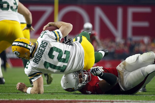 Arizona Cardinals inside linebacker Kenny Demens (54) sacks Green Bay Packers quarterback Aaron Rodgers (12) during an NFL football game, Sunday, Dec. 27, 2015, in Glendale, Ariz. (Jeff Haynes/AP Images for Panini)