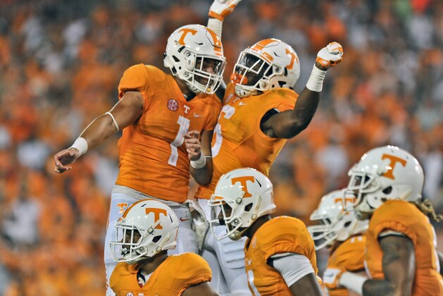 Sep 5, 2015; Nashville, TN, USA; Tennessee Volunteers running back Alvin Kamara (6) celebrates scoring a touchdown against the Bowling Green Falcons with teammate Volunteers running back Jalen Hurd (1) during the second half at Nissan Stadium. Tennessee won 59-30. Mandatory Credit: Jim Brown-USA TODAY Sports