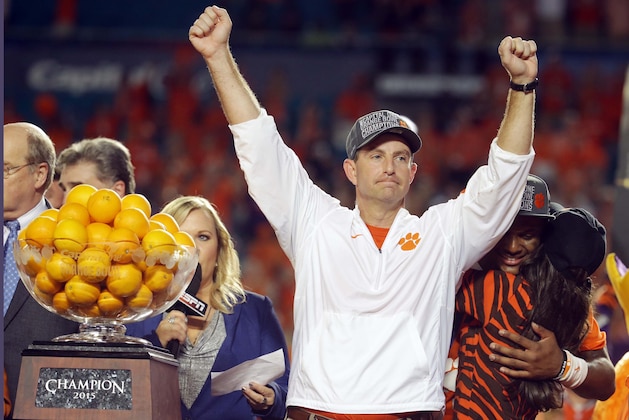 Clemson head coach Dabo Swinney raises his arms after winning the Orange Bowl NCAA college football semifinal playoff game against Oklahoma, Thursday, Dec. 31, 2015, in Miami Gardens, Fla. Clemson defeated Oklahoma 37-17 to advance to the championship game.  (AP Photo/Lynne Sladky)
