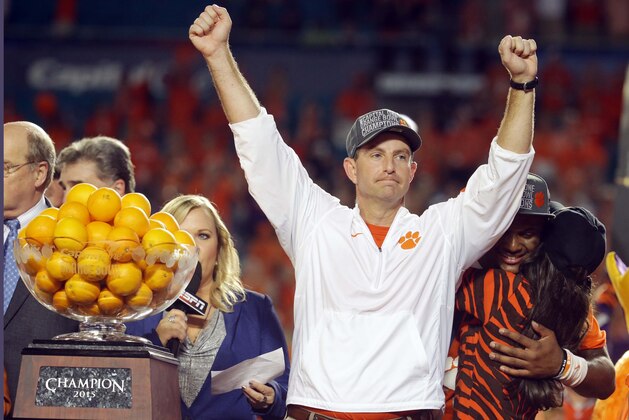 Clemson head coach Dabo Swinney raises his arms after winning the Orange Bowl NCAA college football semifinal playoff game against Oklahoma, Thursday, Dec. 31, 2015, in Miami Gardens, Fla. Clemson defeated Oklahoma 37-17 to advance to the championship game.  (AP Photo/Lynne Sladky)