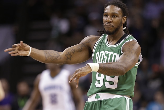 Boston Celtics' Jae Crowder (99) reacts after making a three point basket against the Charlotte Hornets during the second half of an NBA basketball game in Charlotte, N.C., Monday, March 30, 2015. The Celtics won 116-104. (AP Photo/Chuck Burton)