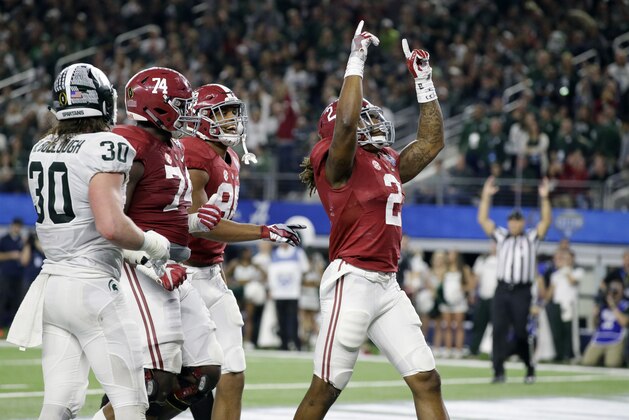 Alabama running back Derrick Henry (2) celebrates his touchdown against Michigan State during the first half of the Cotton Bowl NCAA college football semifinal playoff game, Thursday, Dec. 31, 2015, in Arlington, Texas. (AP Photo/LM Otero) Alabama running back Derrick Henry (2) celebrates his touchdown against Michigan State during the first half of the Cotton Bowl NCAA college football semifinal playoff game, Thursday, Dec. 31, 2015, in Arlington, Texas. (AP Photo/LM Otero)