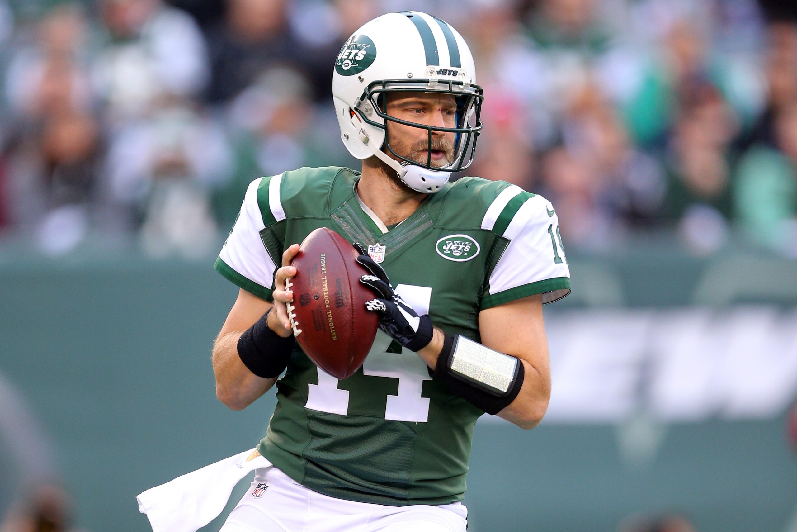 New York Jets quarterback Ryan Fitzpatrick (14) drops back to pass against the New England Patriots during an NFL game at MetLife Stadium in East Rutherford, N.J. on Sunday, Dec. 27, 2015. (AP Photo/Brad Penner) New York Jets quarterback Ryan Fitzpatrick (14) drops back to pass against the New England Patriots during an NFL game at MetLife Stadium in East Rutherford, N.J. on Sunday, Dec. 27, 2015. (AP Photo/Brad Penner)