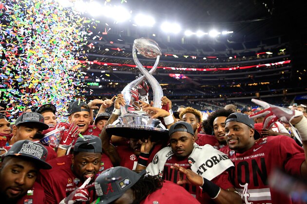 ARLINGTON, TX - DECEMBER 31:  The Alabama Crimson Tide celebrate with the trophy after defeating the Michigan State Spartans 38 to 0 in the Goodyear Cotton Bowl at AT&T Stadium on December 31, 2015 in Arlington, Texas.  (Photo by Jamie Squire/Getty Images)