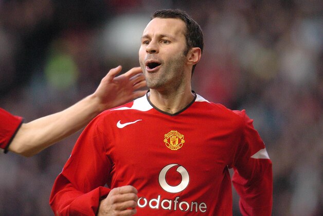 MANCHESTER, UNITED KINGDOM:  Manchester United's Ryan Giggs celebrates after scoring against Bolton to make it 1-0 during today's Premiereship clash at Old Trafford, Manchester, 26 December 2004. AFP PHOTO PAUL BARKER  - No telcos, website uses subject to subscription of a license with FAPL on  www.faplweb.com  (Photo credit should read PAUL BARKER/AFP/Getty Images)