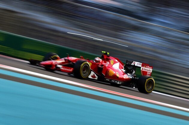 Ferrari's Finnish driver  Kimi Raikkonen races during the Abu Dhabi Formula One Grand Prix at the Yas Marina circuit on November 29, 2015.   AFP PHOTO / ANDREJ ISAKOVIC / AFP / ANDREJ ISAKOVIC        (Photo credit should read ANDREJ ISAKOVIC/AFP/Getty Images)
