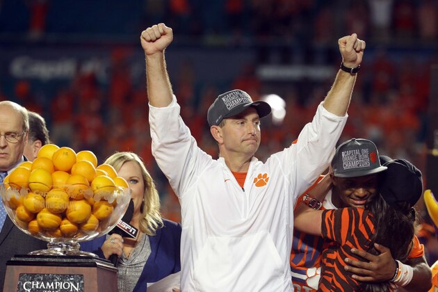 Clemson head coach Dabo Swinney raises his arms after winning the Orange Bowl NCAA college football semifinal playoff game against Oklahoma, Thursday, Dec. 31, 2015, in Miami Gardens, Fla. Clemson defeated Oklahoma 37-17 to advance to the championship game. (AP Photo/Lynne Sladky)