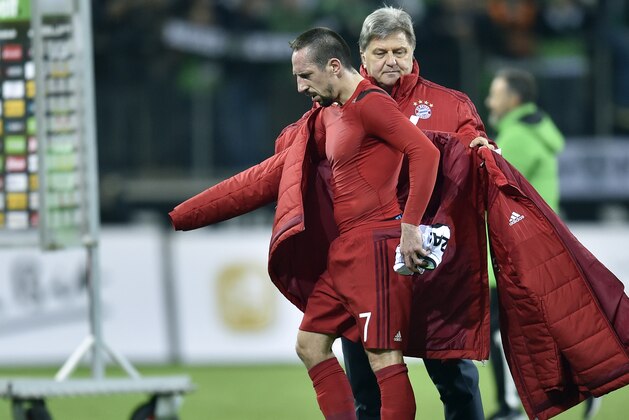 Bayern's Franck Ribery gets a coat   after losing the German Bundesliga soccer match between Borussia Moenchengladbach and Bayern Munich in Moenchengladbach, Germany, Saturday, Dec. 5, 2015.  Borussia won the match by  3-1. (AP Photo/Martin Meissner)